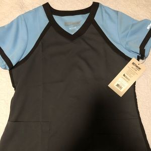 Brand new Greys Anatomy Active top size Medium.